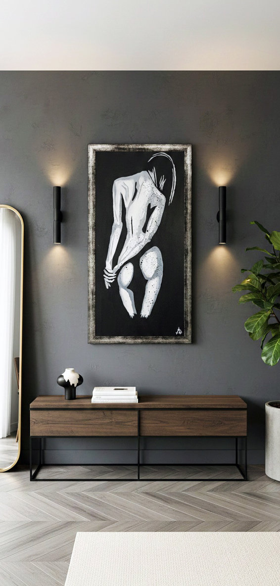 Figura umana stilizzata bianca e grigia su sfondo nero opaco. Qui è mostrato un suggerimento di ambientazione.